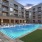 Luxury pool with cabanas and tanning deck 