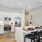 New kitchen with white cabinets and quartz countertops